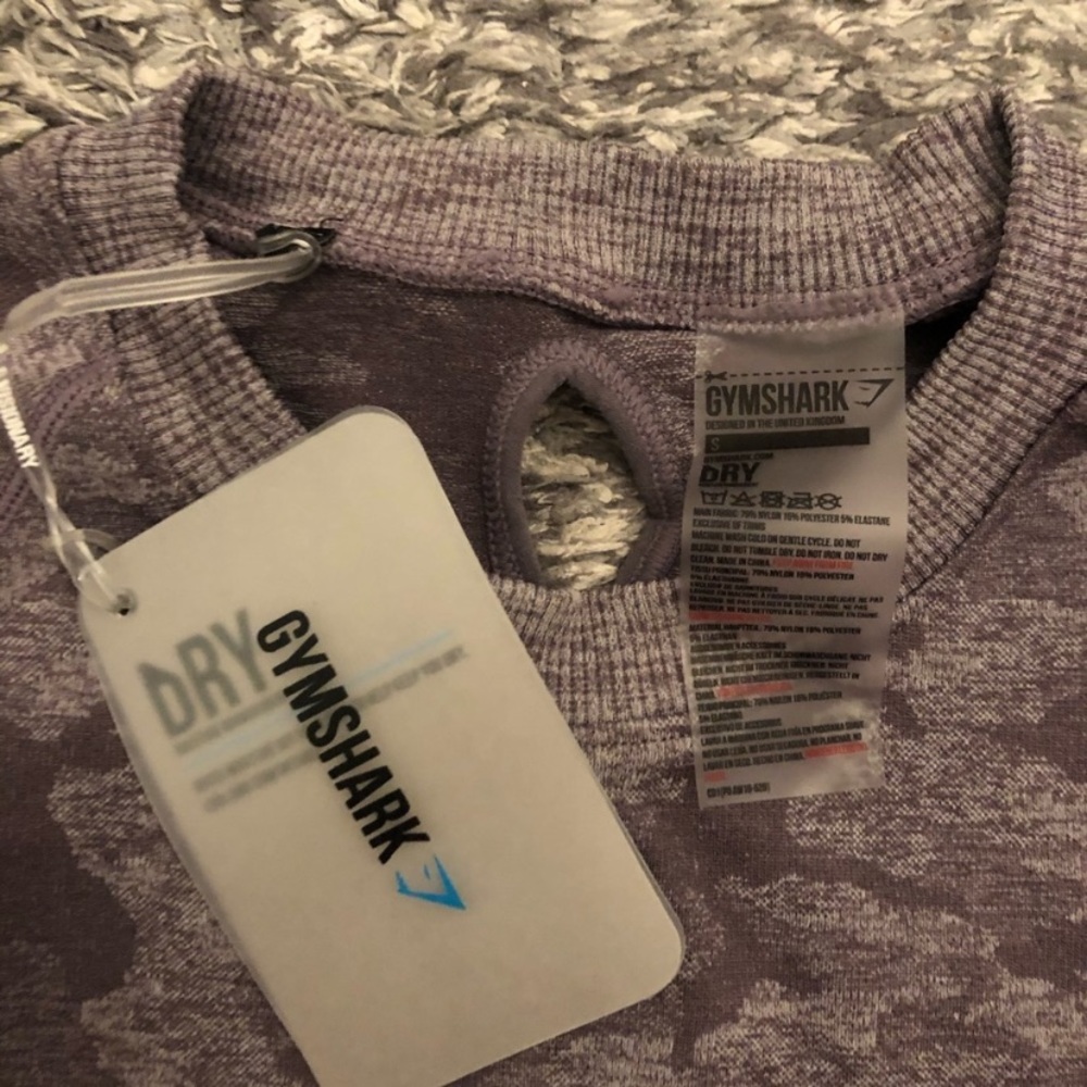 NWOT cropped long sleeve workout top.